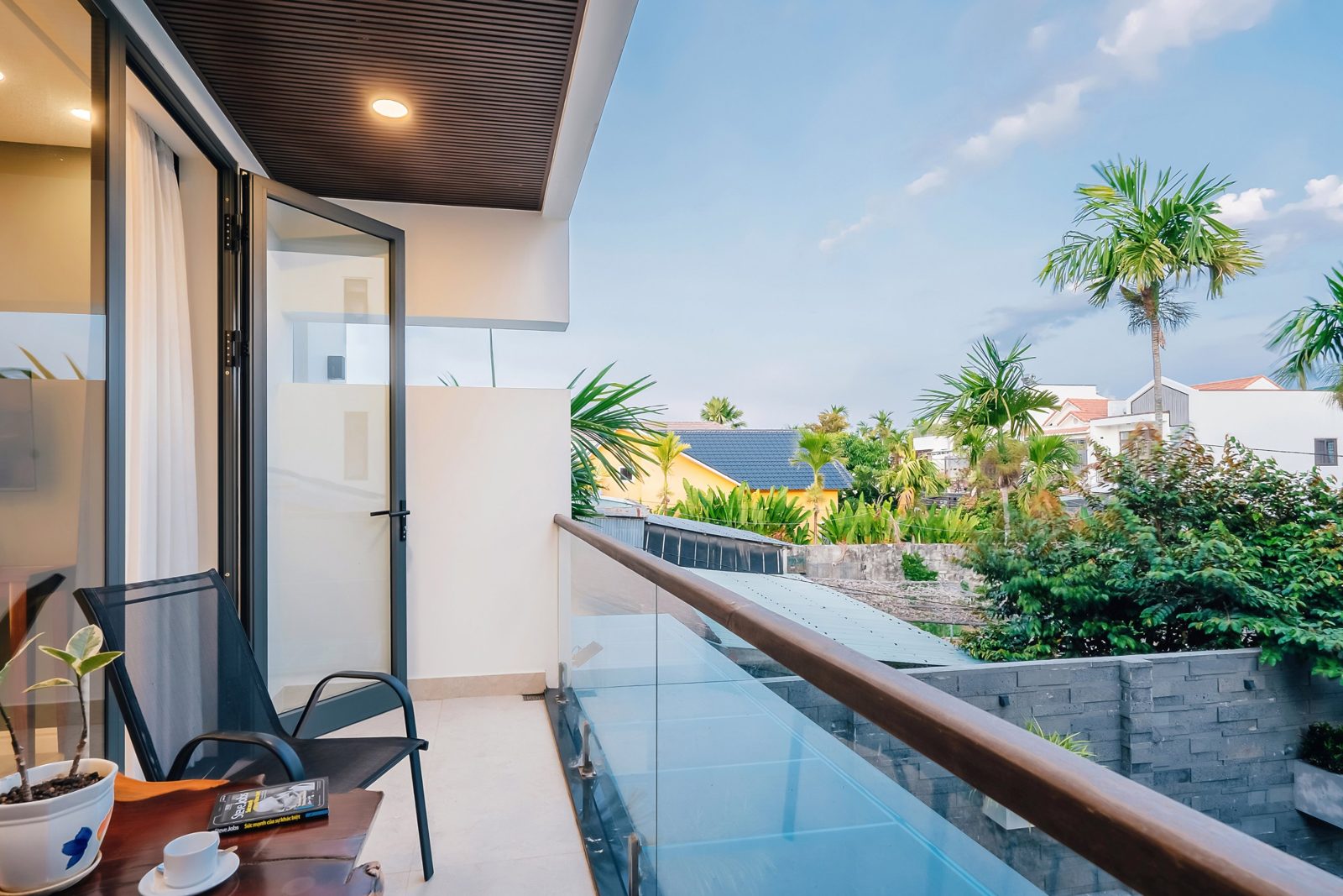 Balcony looking out over palms