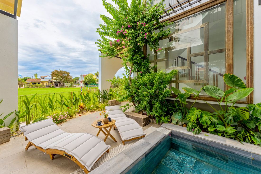 Maison de Chinh pool and rice fields